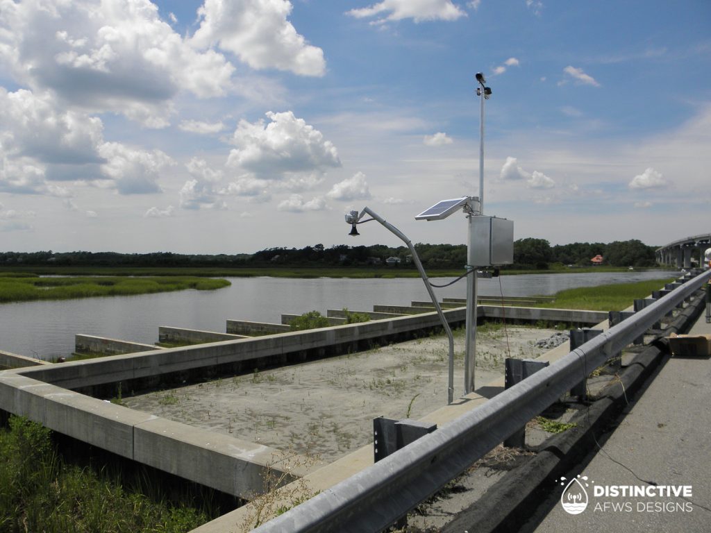 Installed ALERT2 (via cellular) water level monitoring station at the entrance to Sunset Beach, North Carolina